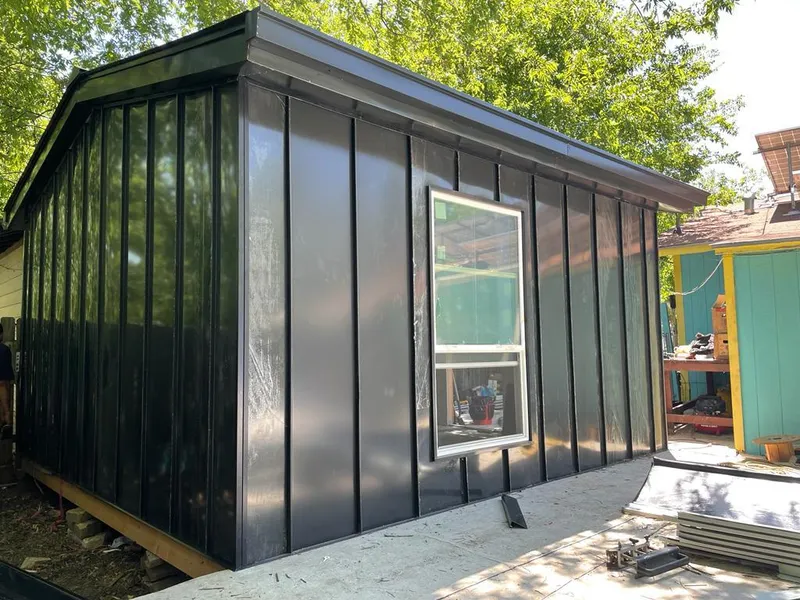 Black standing seam metal wall panels for Roof Inspection in Crestwood