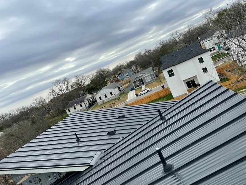 Standing seam metal roof panels with vents for Skylight Repair in Crestwood
